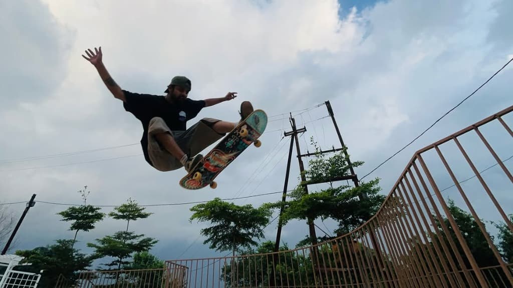 BhopalSB Skater spreading arms mid-air during skate session