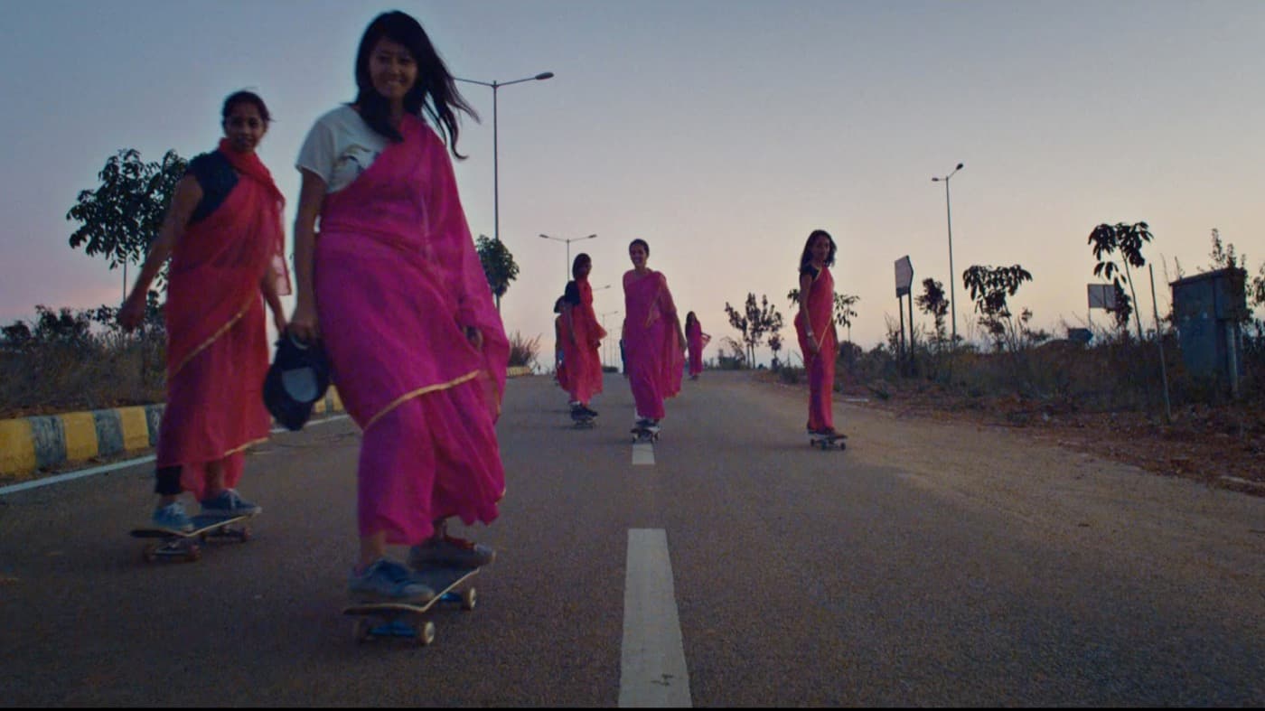 Indian women riding longboards together in Bengaluru